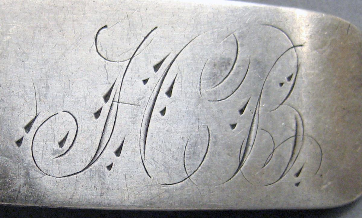 1998.0004.3709 Silver spoon engraving