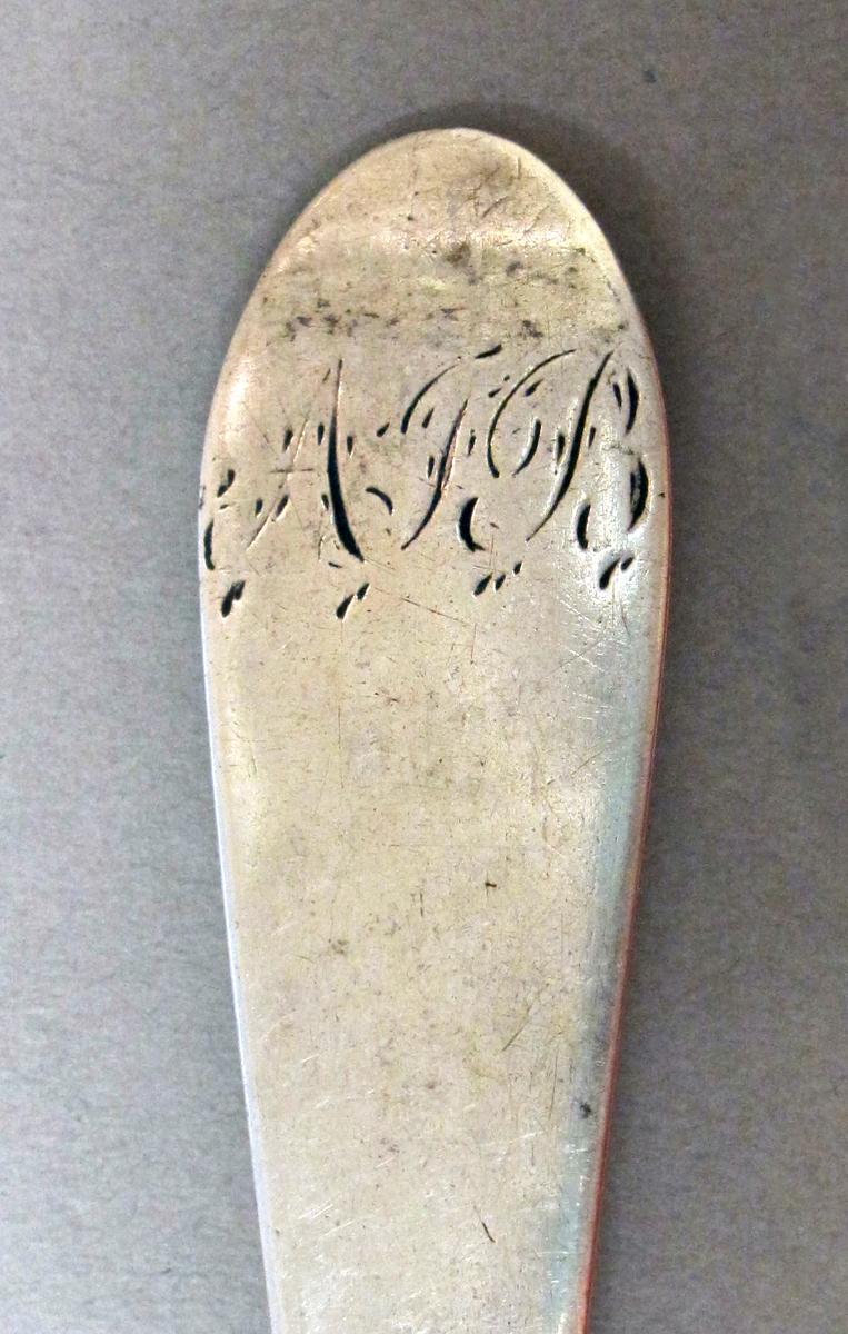 1998.0004.3723 Silver spoon engraving