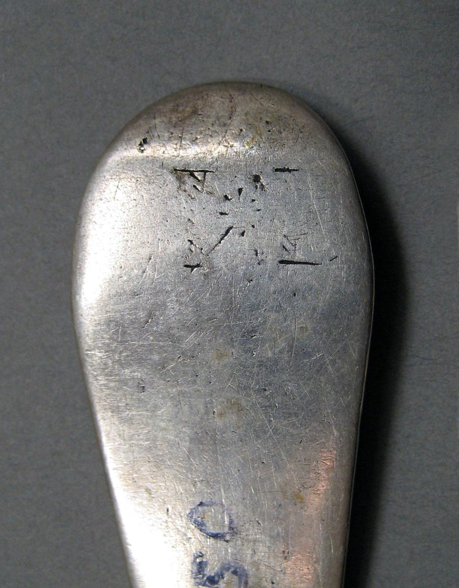 1998.0004.3793 Silver spoon engraving