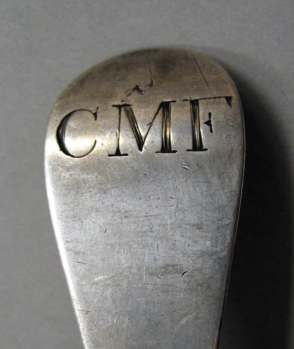 1998.0004.3799 Silver spoon engraving