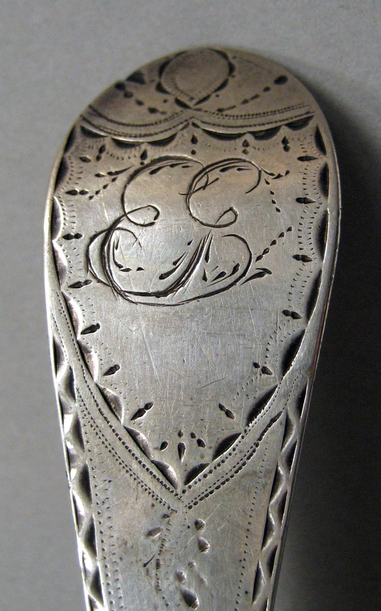 1998.0004.3800.002 Silver spoon engraving