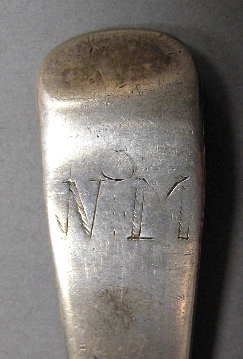 1998.0004.3801.001 Silver spoon engraving