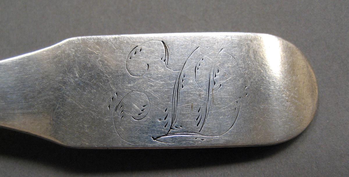 1998.0004.3802 Silver spoon engraving