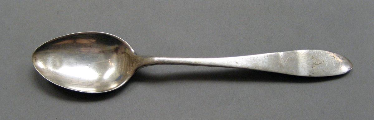 1998.0004.3803 Silver spoon upper surface