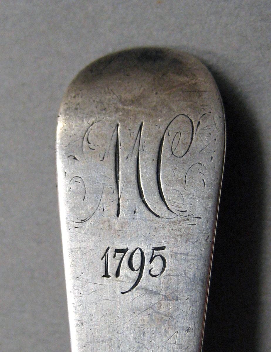 1998.0004.3806 Silver spoon engraving