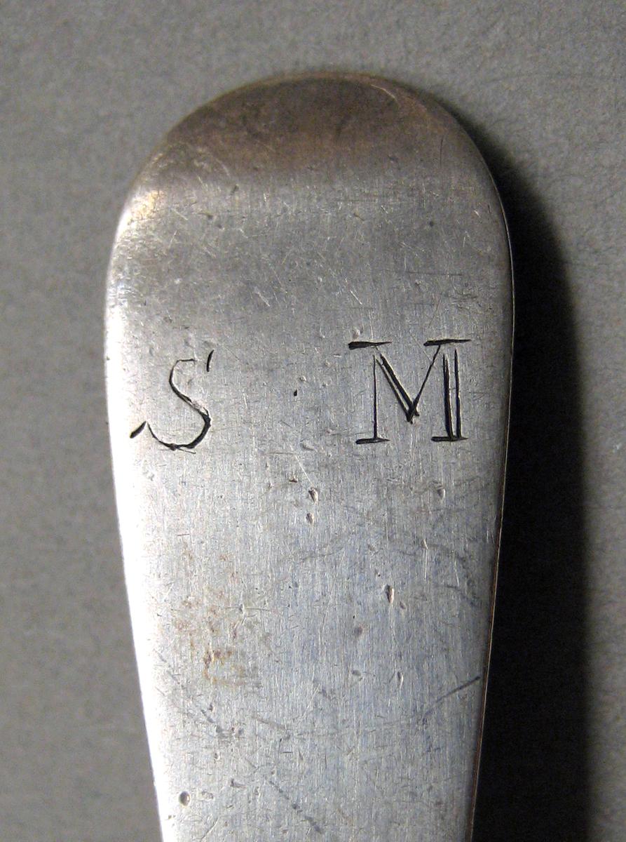 1998.0004.3807 Silver spoon engraving