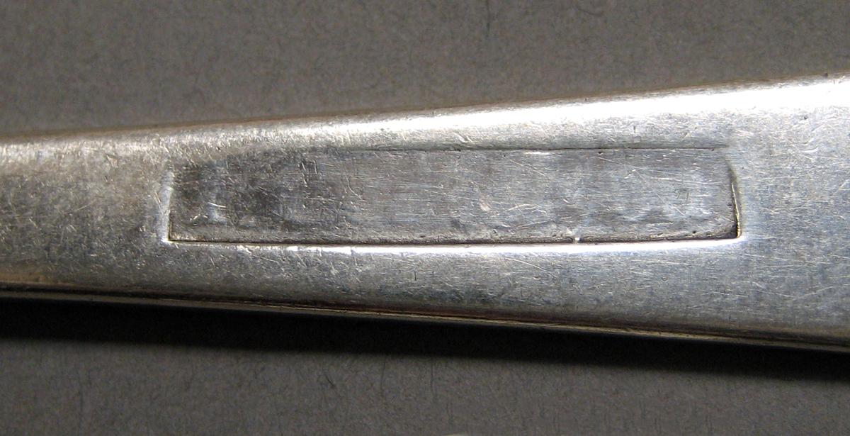 1998.0004.3810 Silver spoon mark