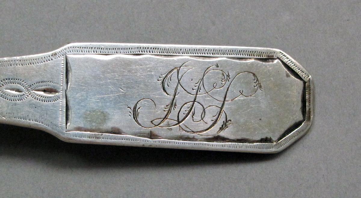 1998.0004.3921 Silver spoon engraving