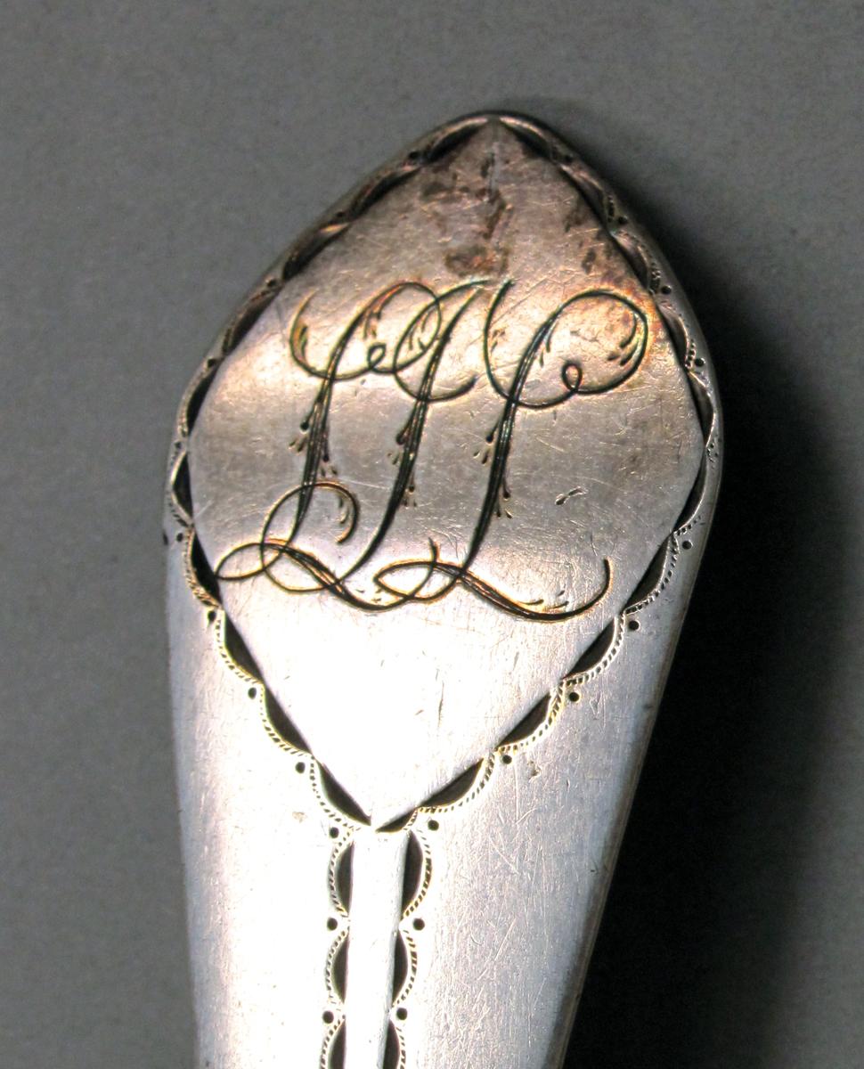 1998.0004.3926 Silver spoon engraving
