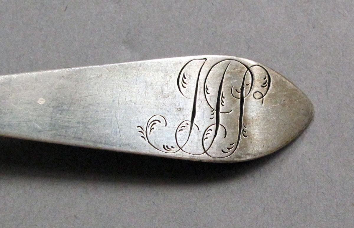 1998.0004.3929 Silver spoon engraving