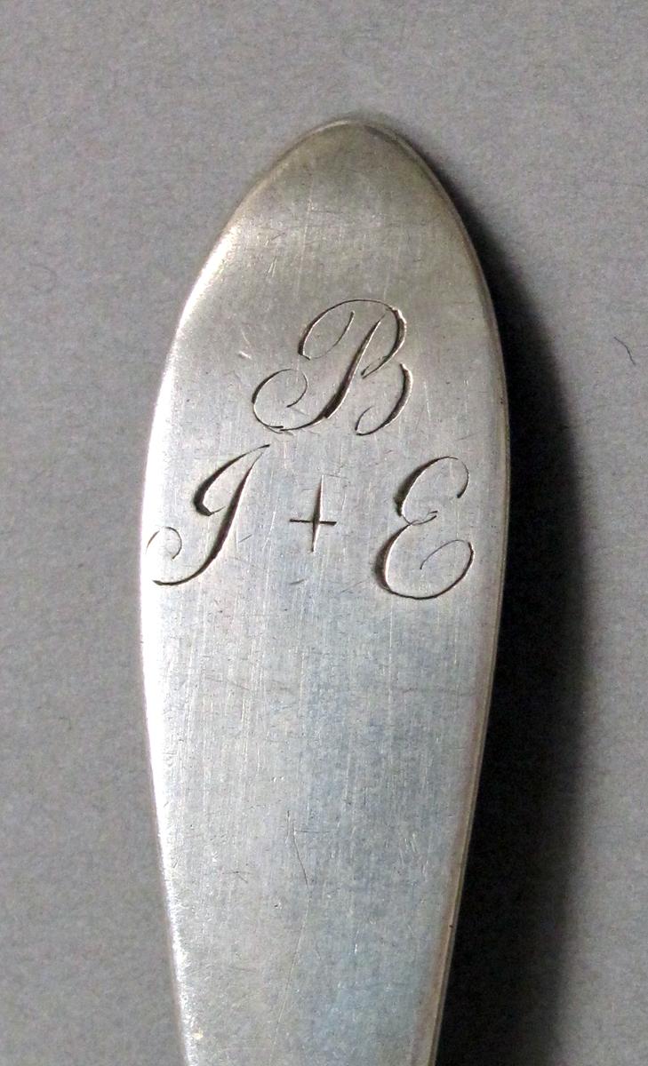 1998.0004.3931 Silver spoon engraving