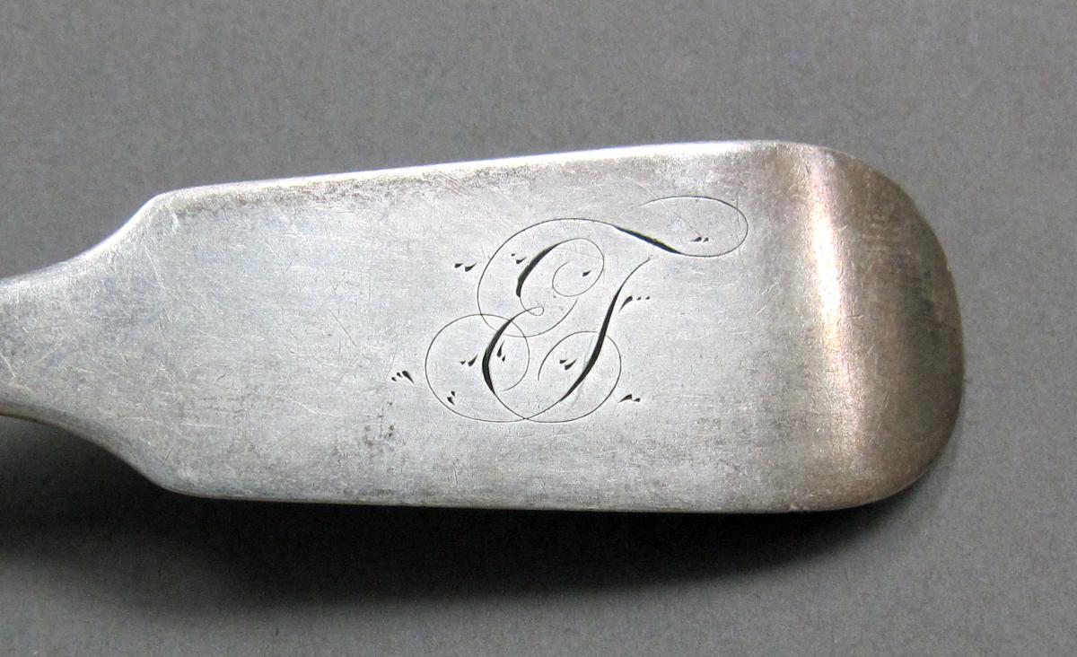 1998.0004.3932 Silver spoon engraving