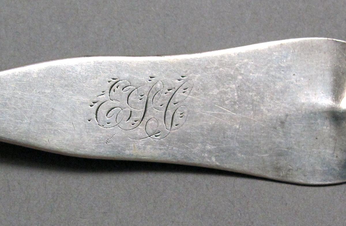 1998.0004.3935 Silver spoon engraving