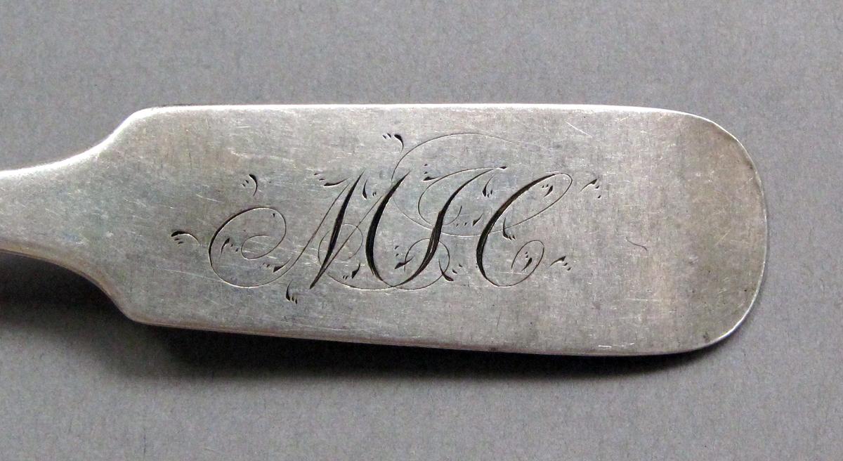 1998.0004.3936 Silver spoon engraving