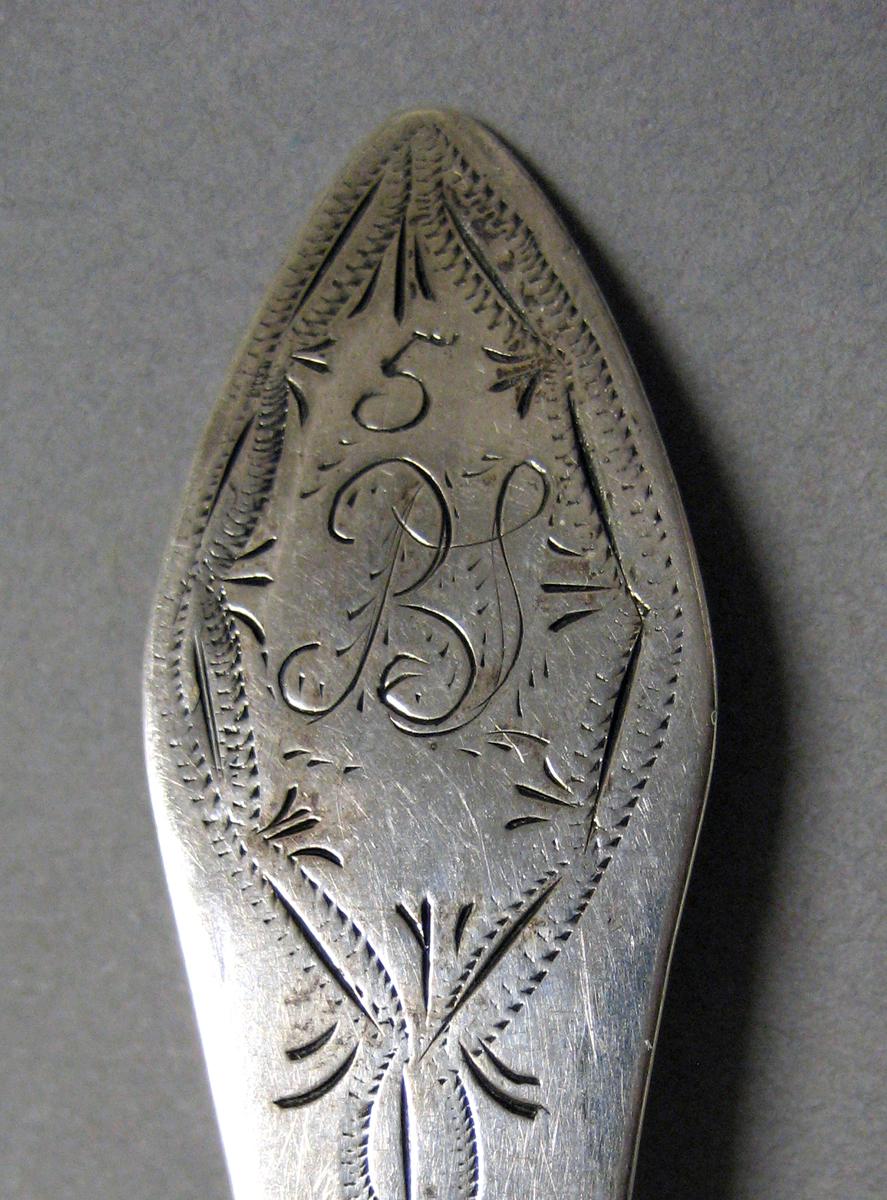 1998.0004.3976 Silver spoon engraving