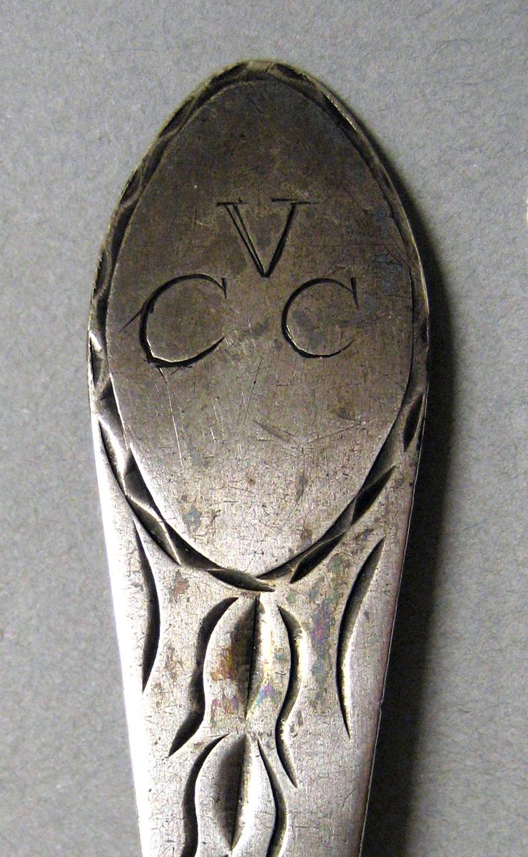 1998.0004.3977.002 Silver spoon engraving