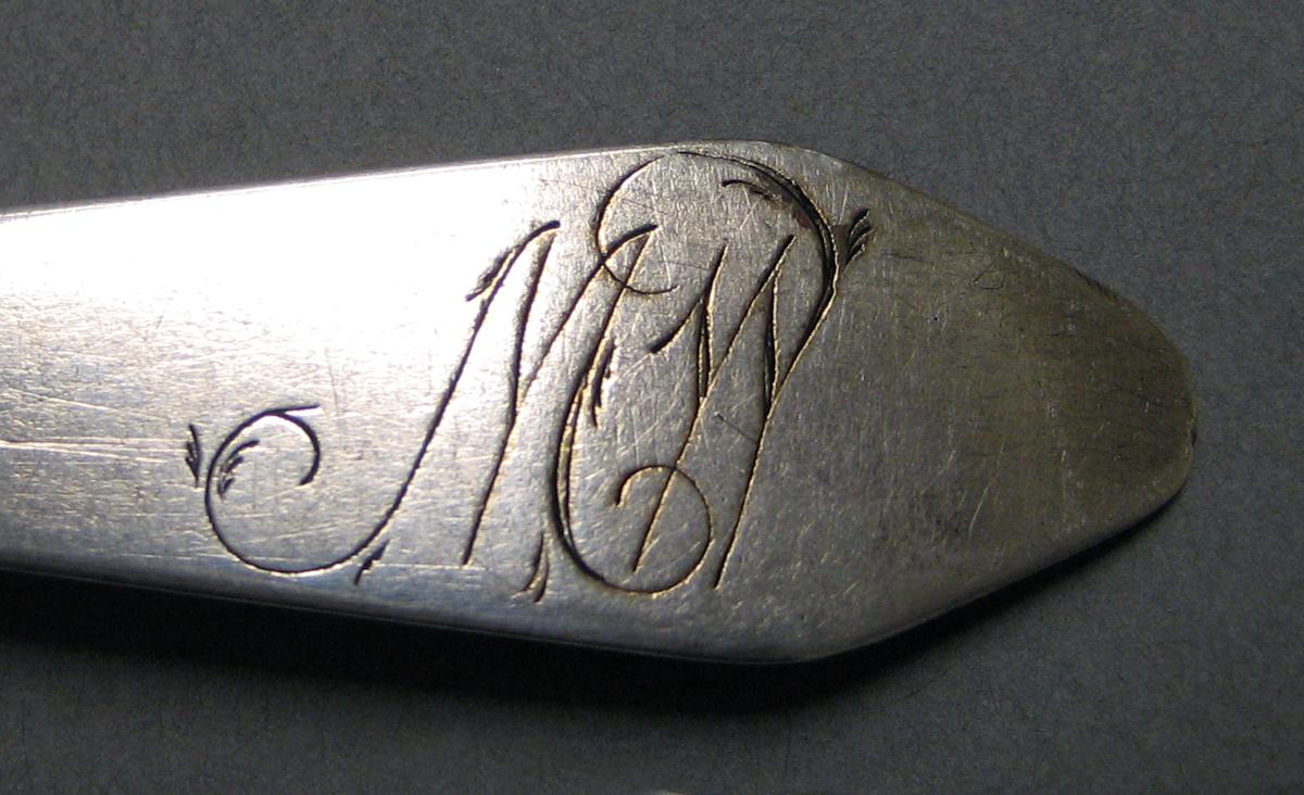 1998.0004.3988 Silver spoon engraving