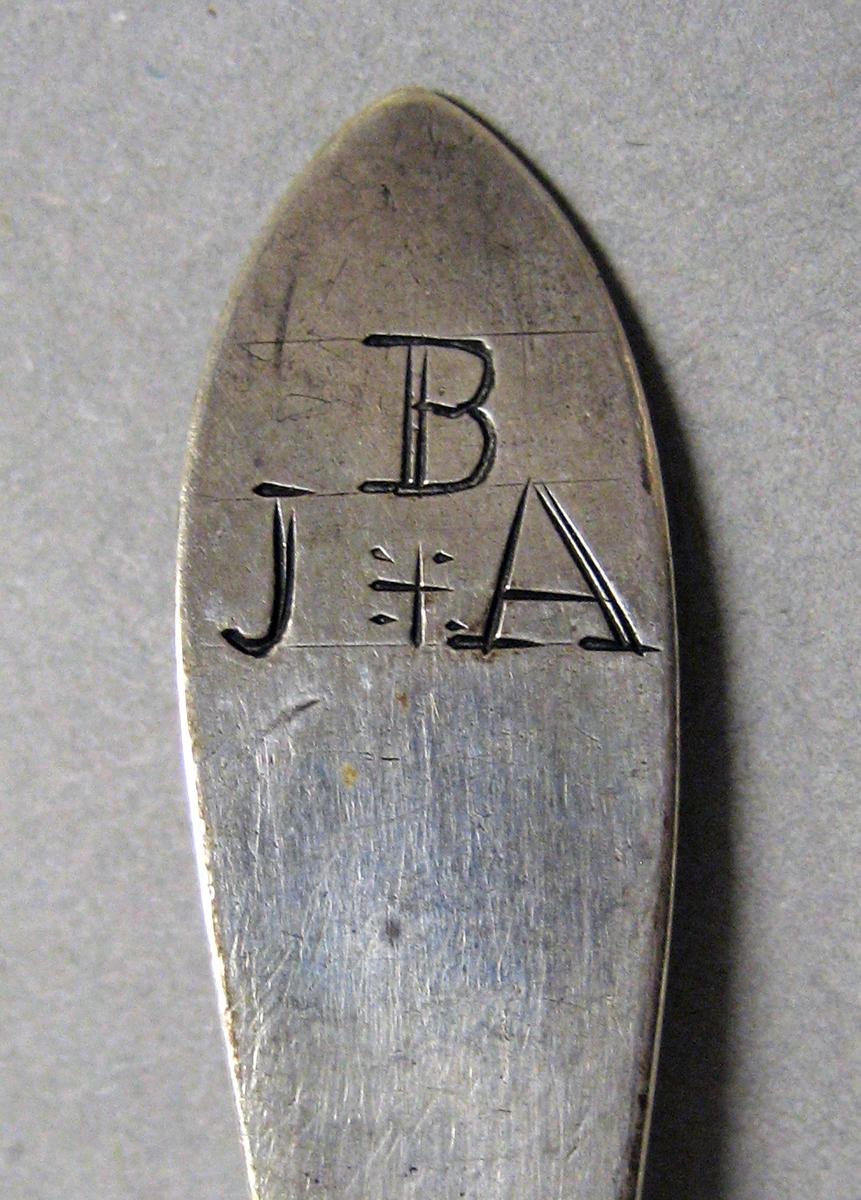 1998.0004.3989 Silver spoon engraving