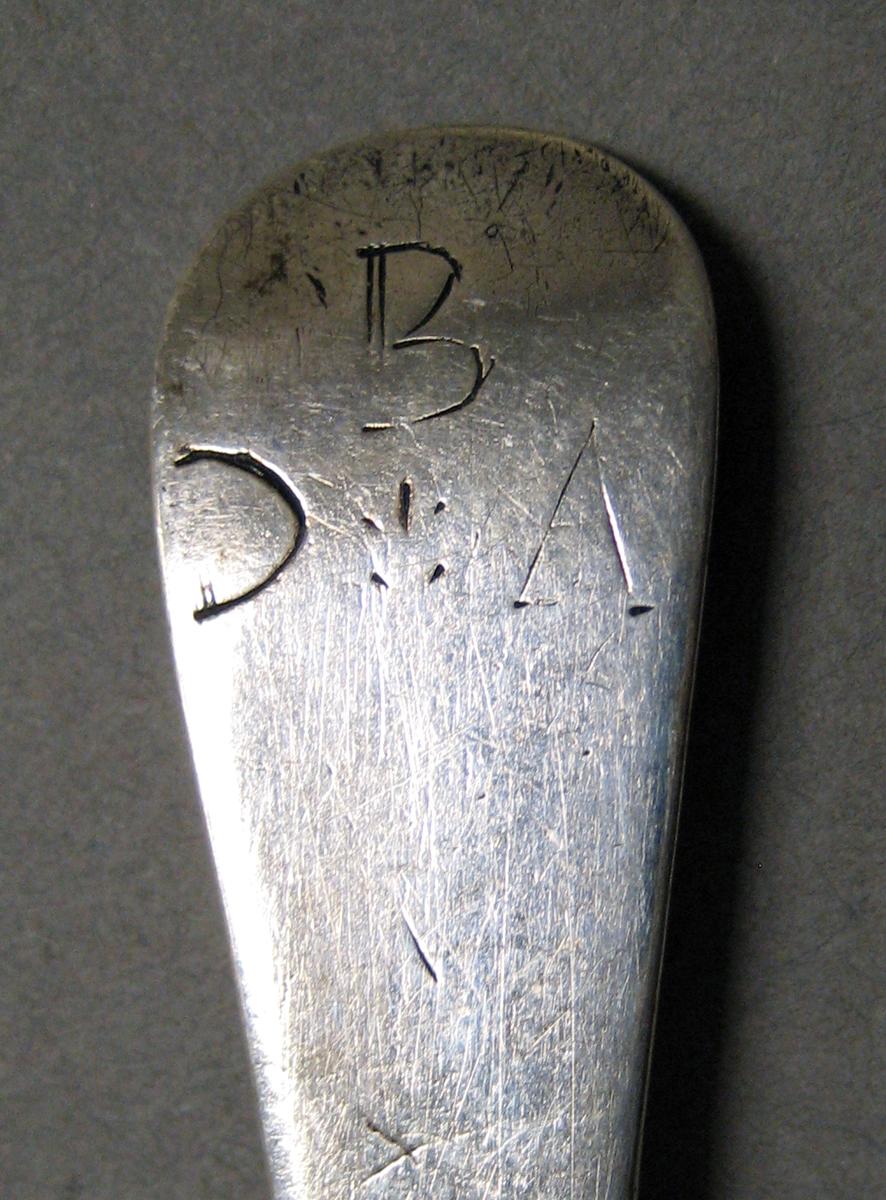 1998.0004.3990 Silver spoon engraving
