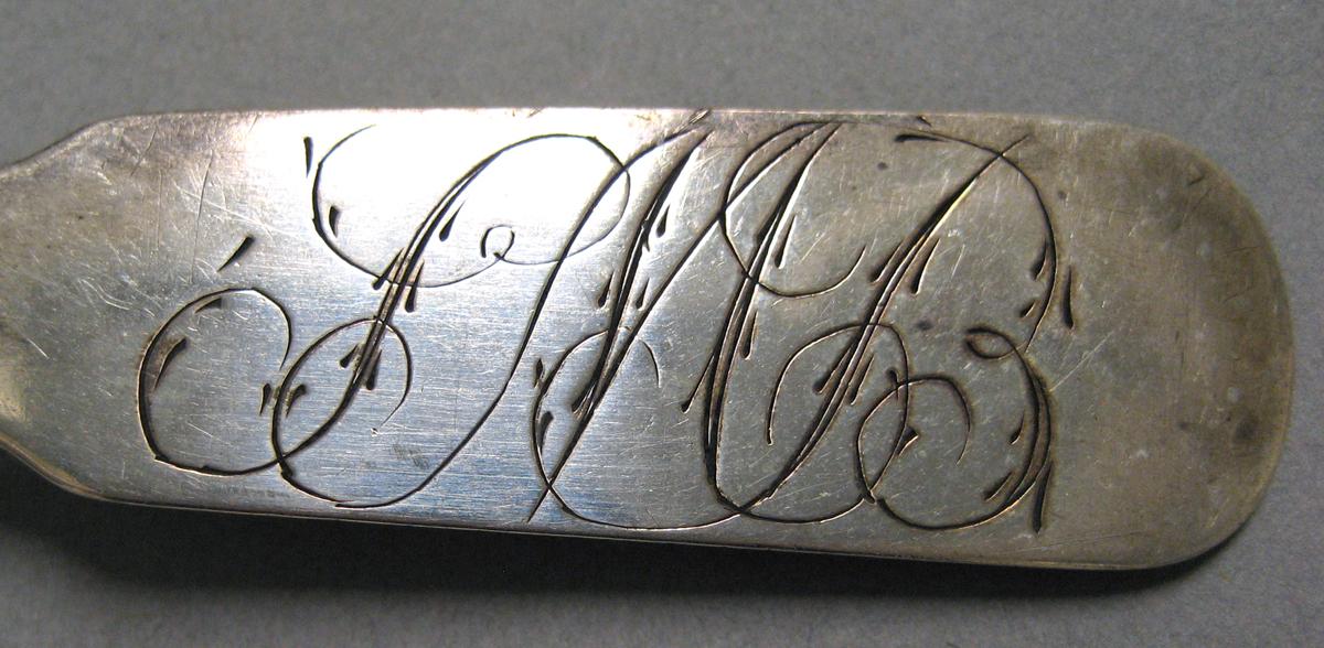 1998.0004.3992 Silver spoon engraving