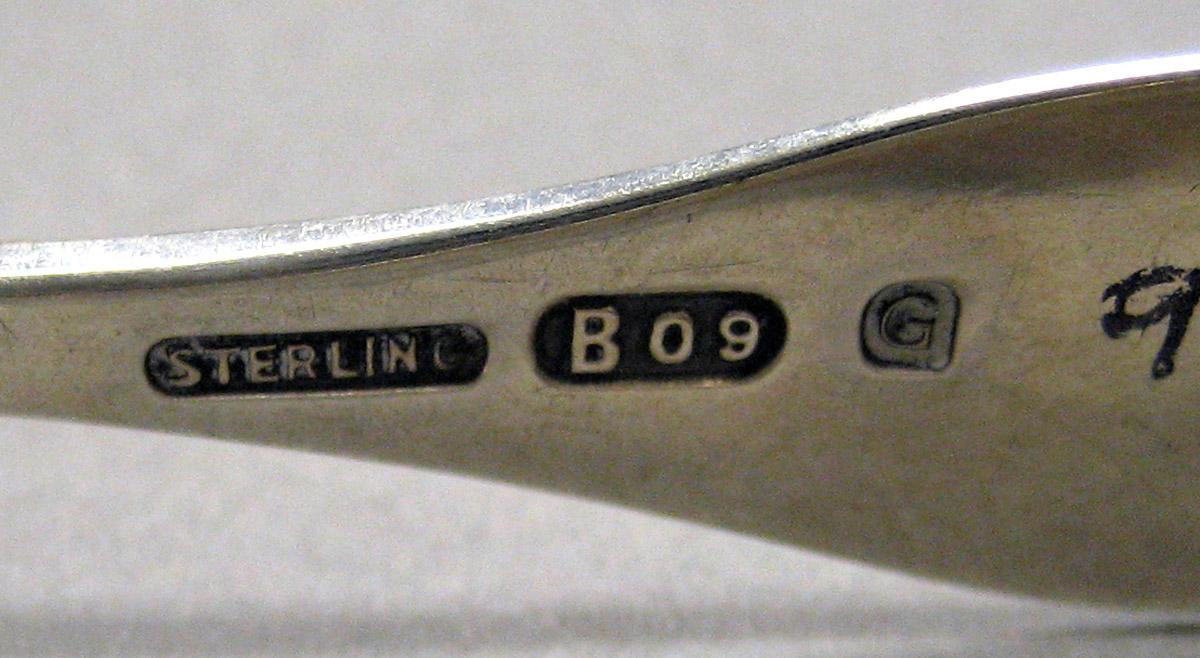 1998.0004.4043 Silver Tongs mark