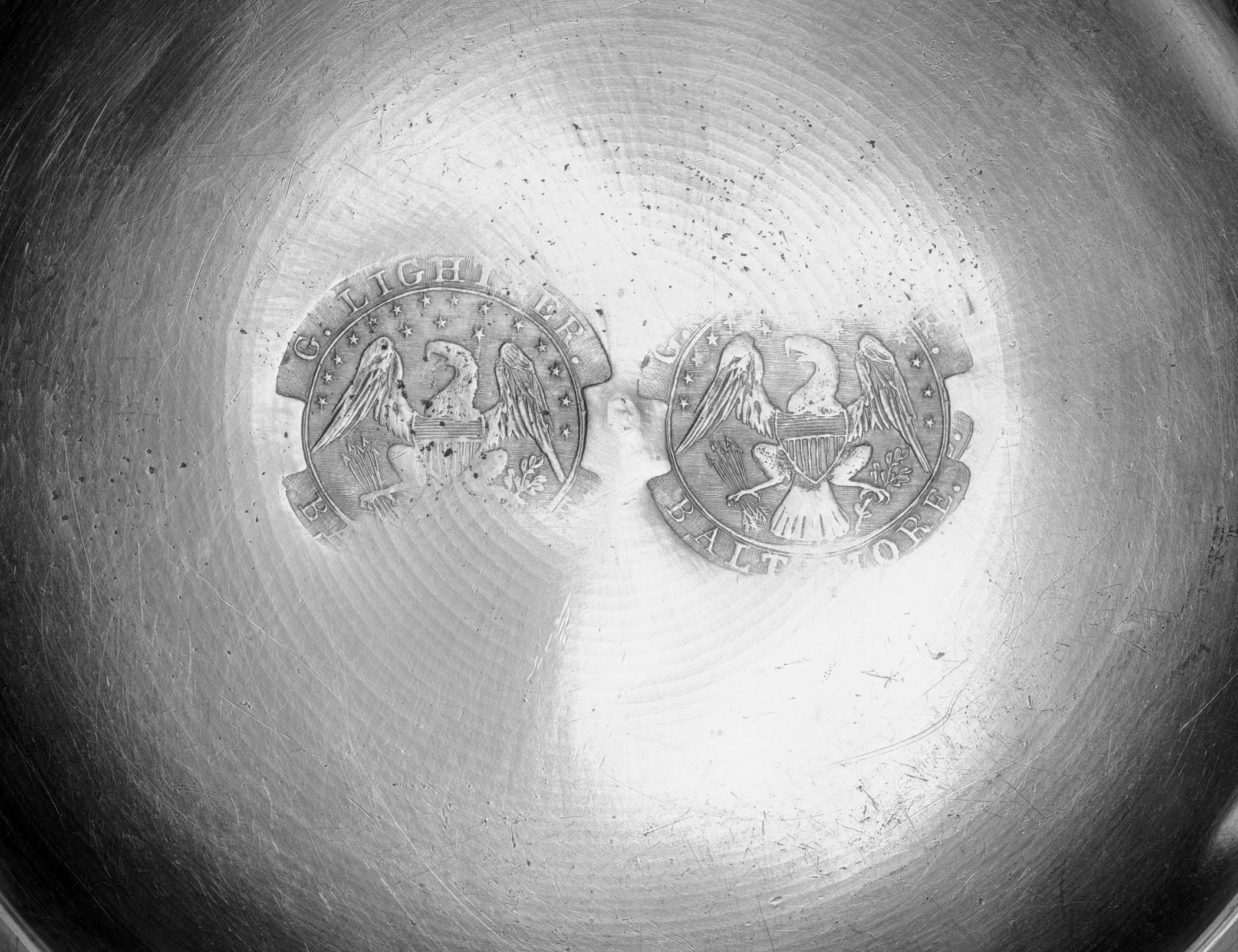 1958.0639 Pewter plate (marks)