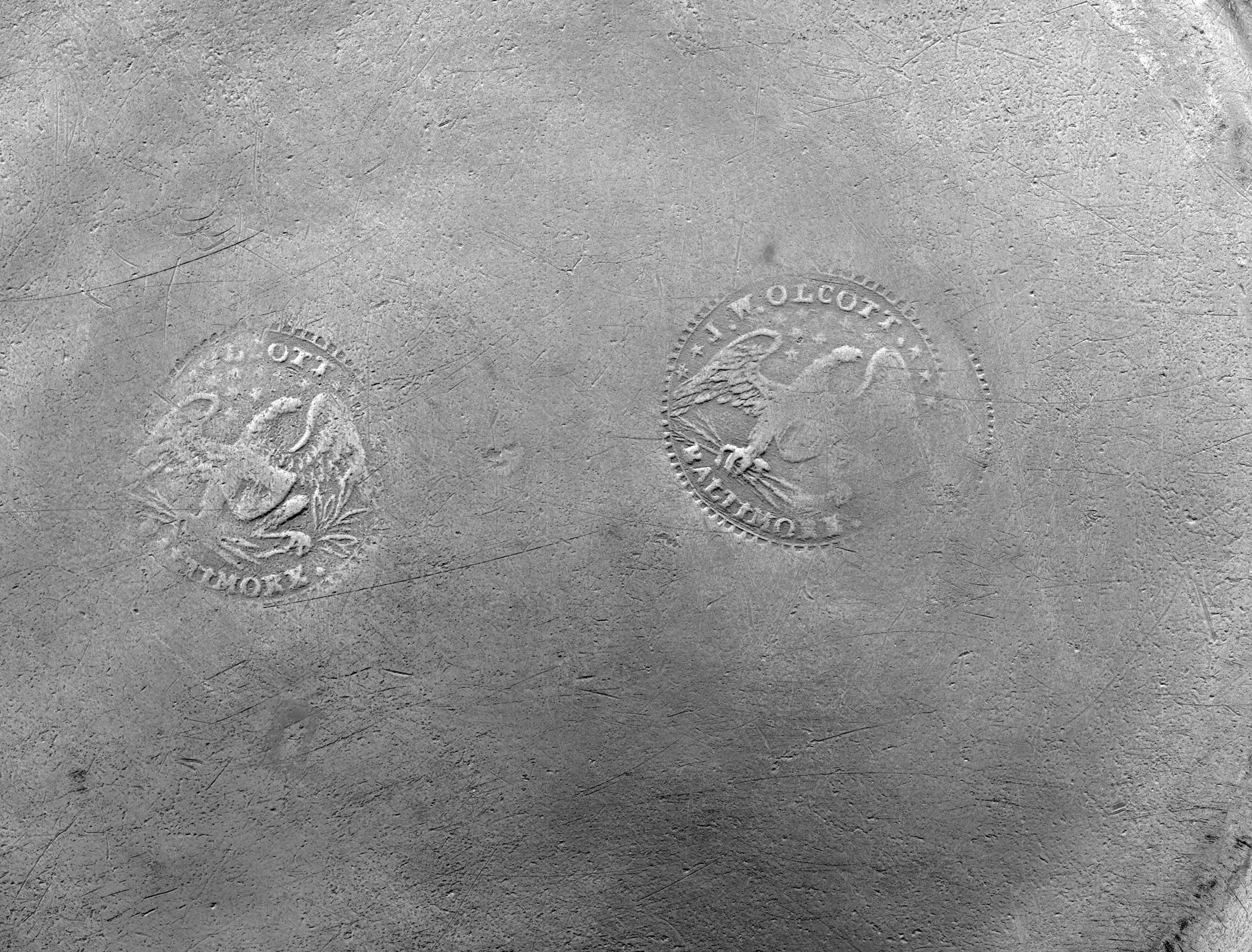 1958.0640 Pewter plate (marks)