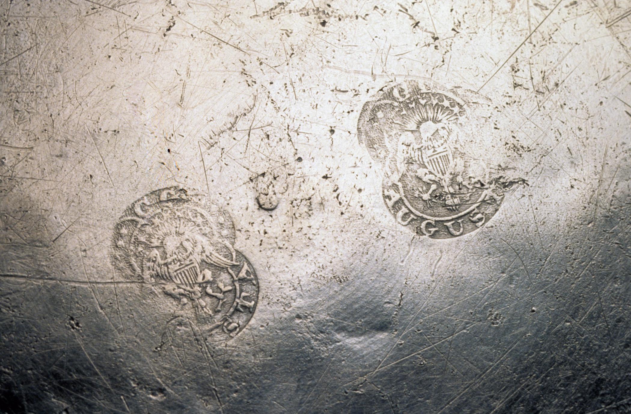 1958.0641 Pewter dish (marks)
