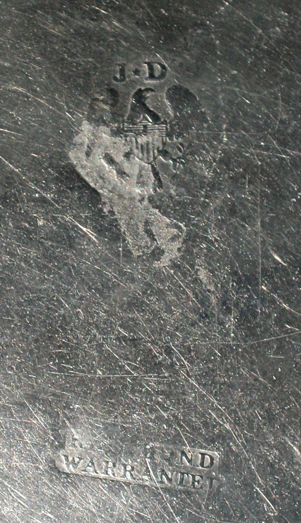 1958.0944 Pewter plate (marks)