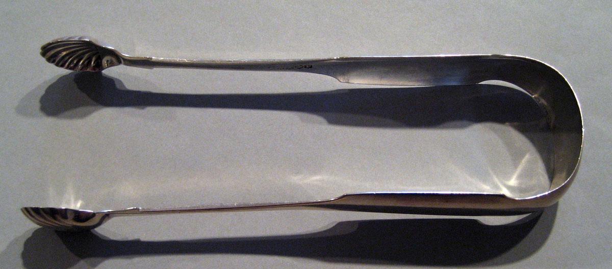 1998.0004.453 Silver Tongs view 1