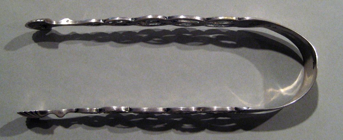 1998.0004.467 Silver Tongs view 1