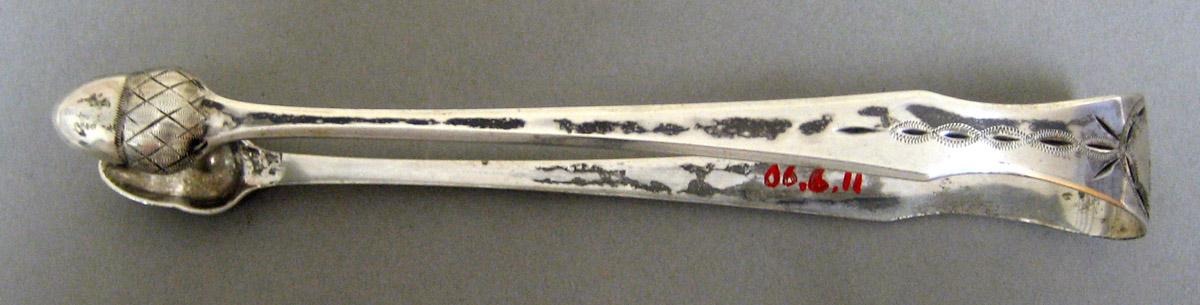 2006.0006.011 Silver Tongs view 2