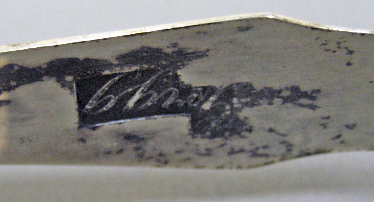2006.0006.011 Silver Tongs mark