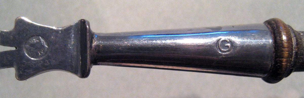 1998.0004.577 Silver Strainer marks on handle