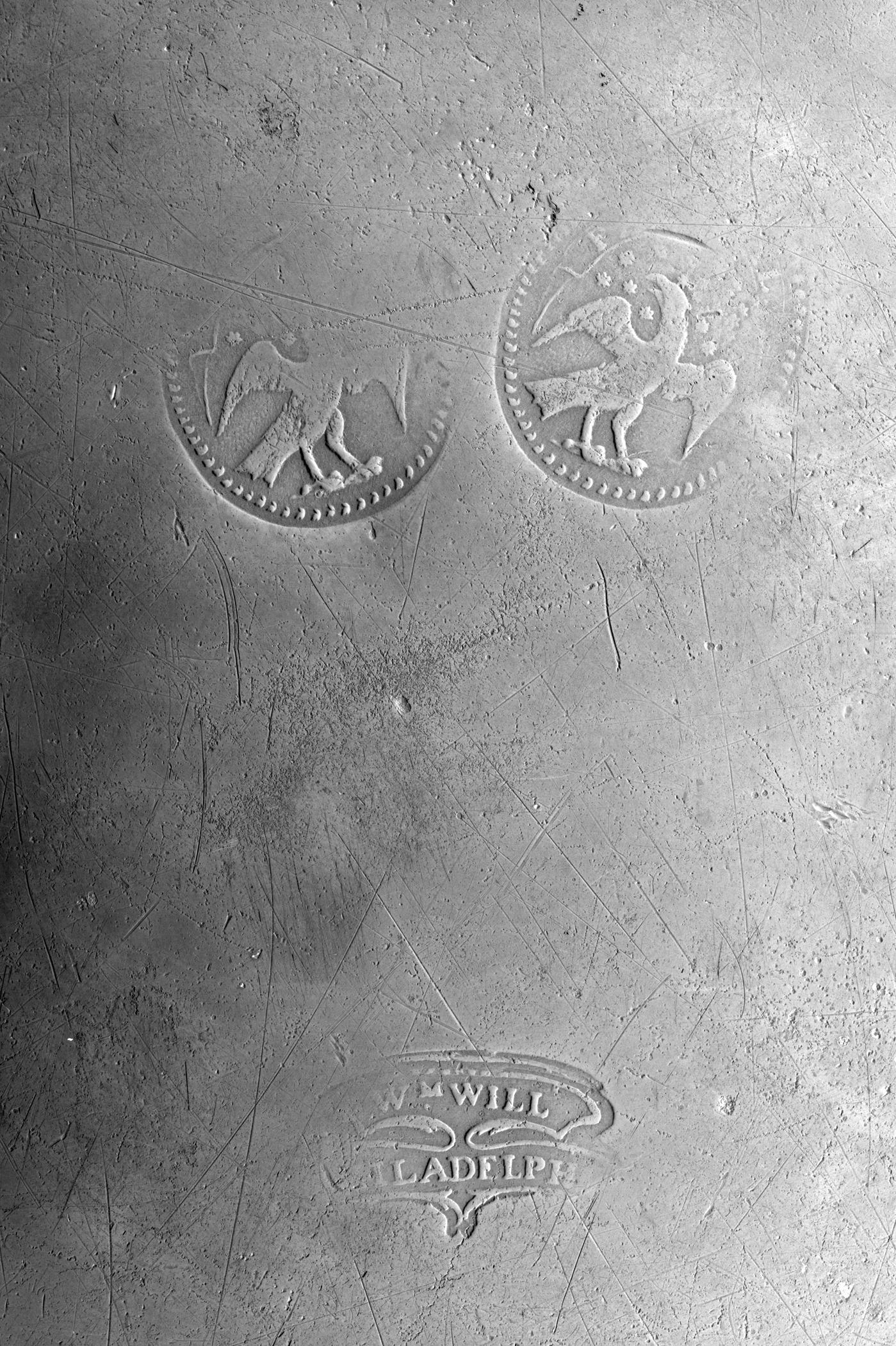 1958.0660 Pewter plate (marks)