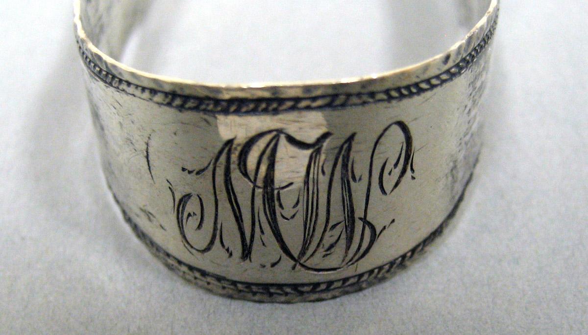 2006.0006.016 Silver Tongs engraving