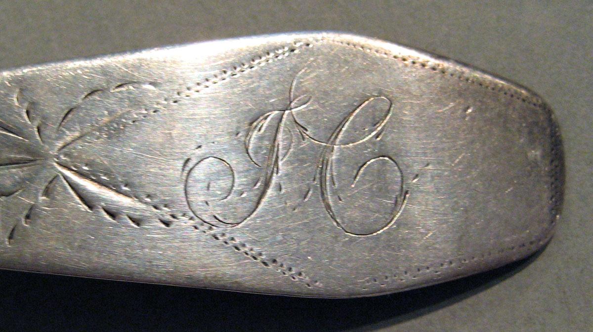 1998.0004.657.001 Silver Spoon engraving