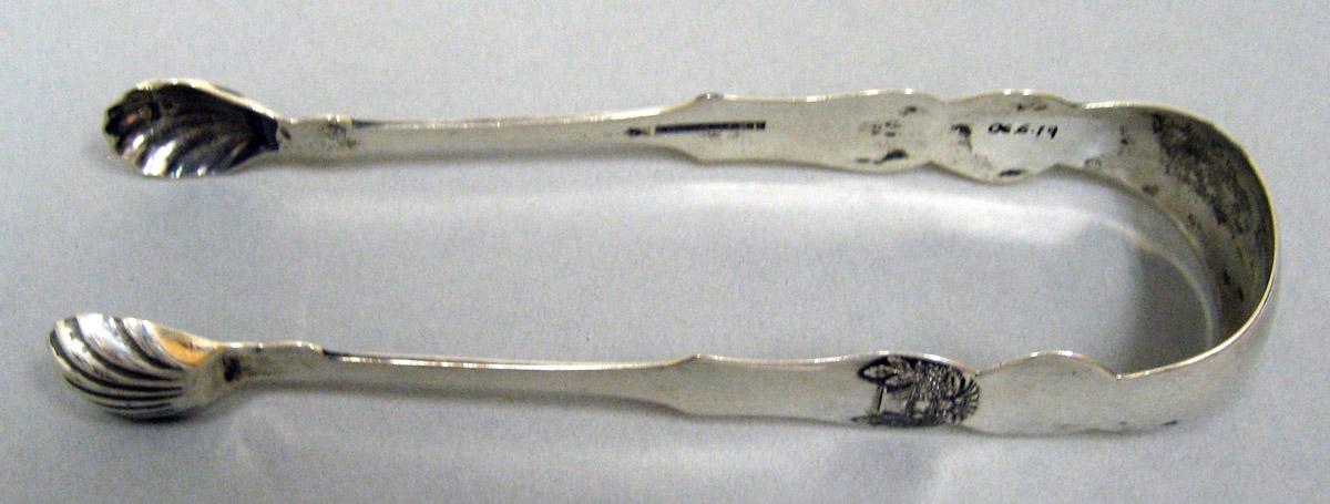 2006.0006.019 Silver Tongs view 1
