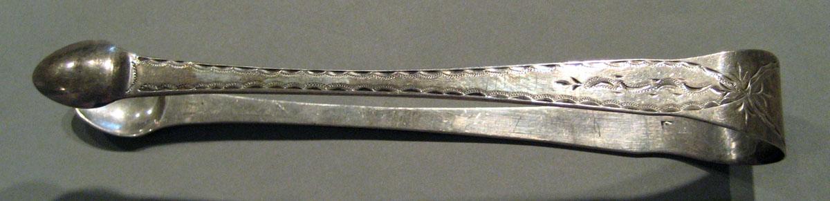 1998.0004.718 Silver Tongs view 2