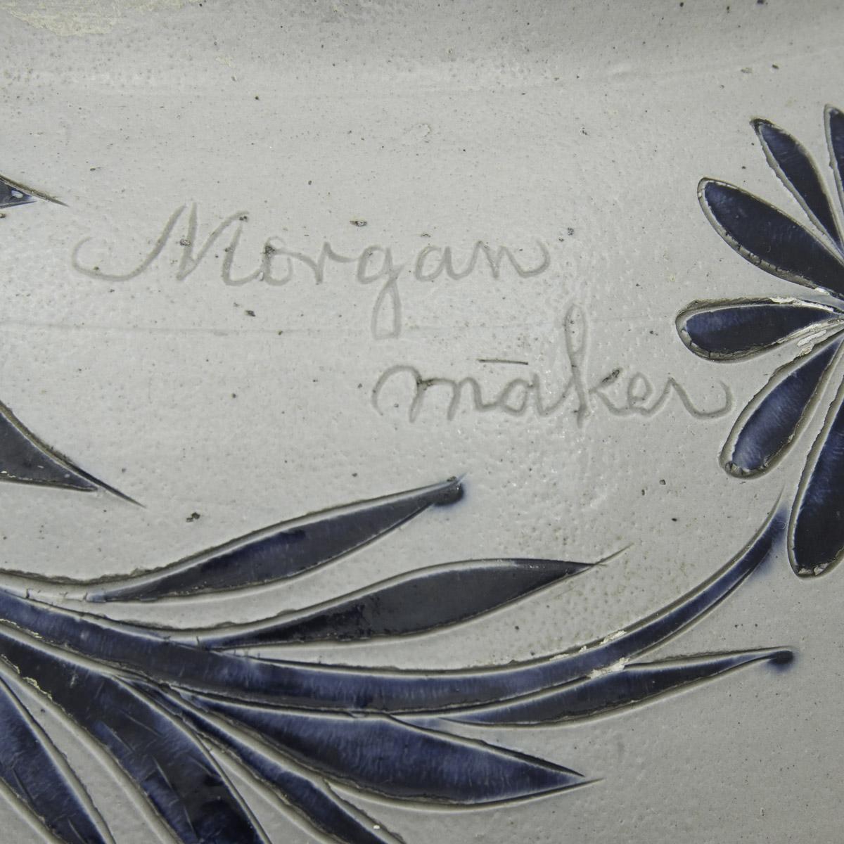 1958.0671 Pitcher (side inscription)