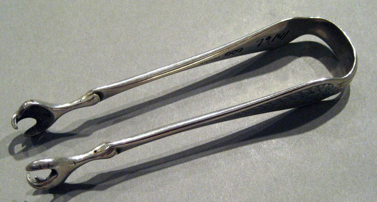 1998.0004.860 Silver Tongs view 1