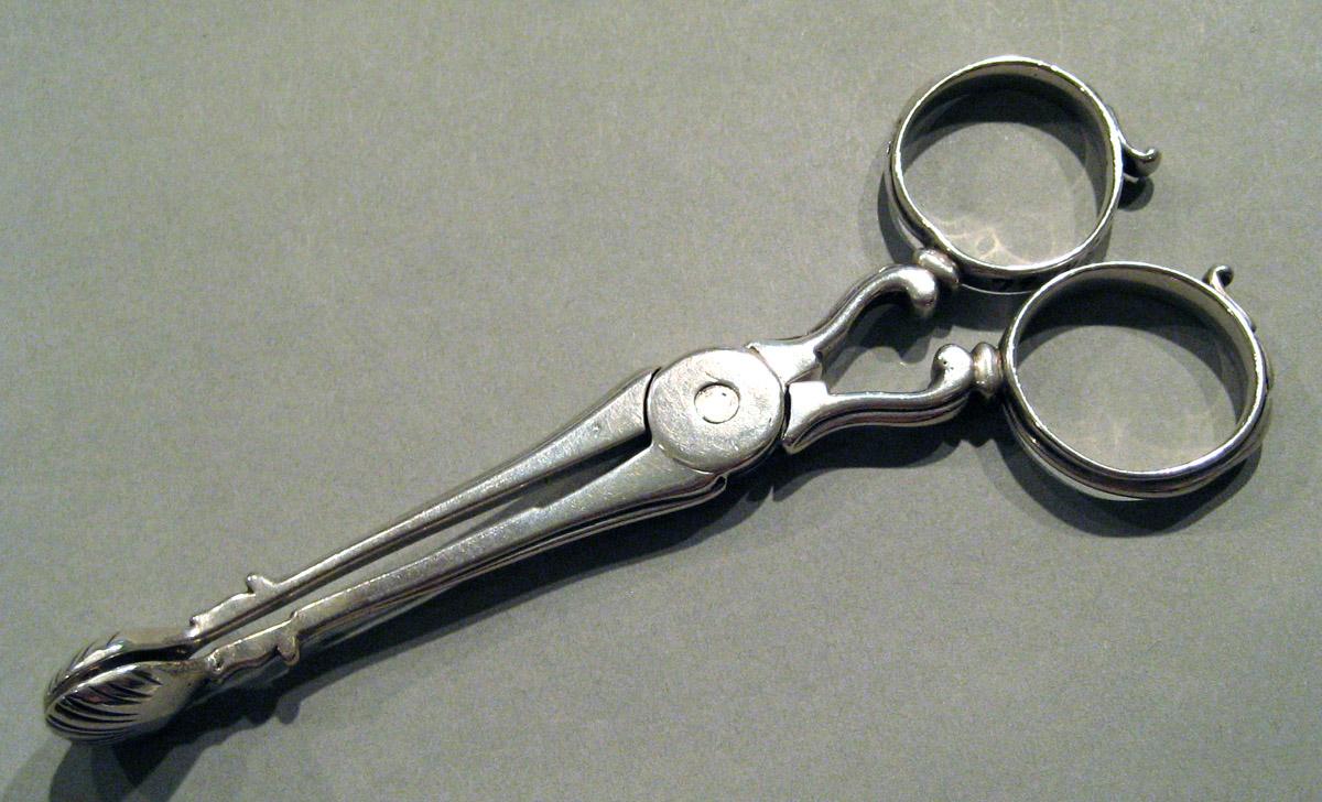 1998.0004.864 Silver Tongs view 1