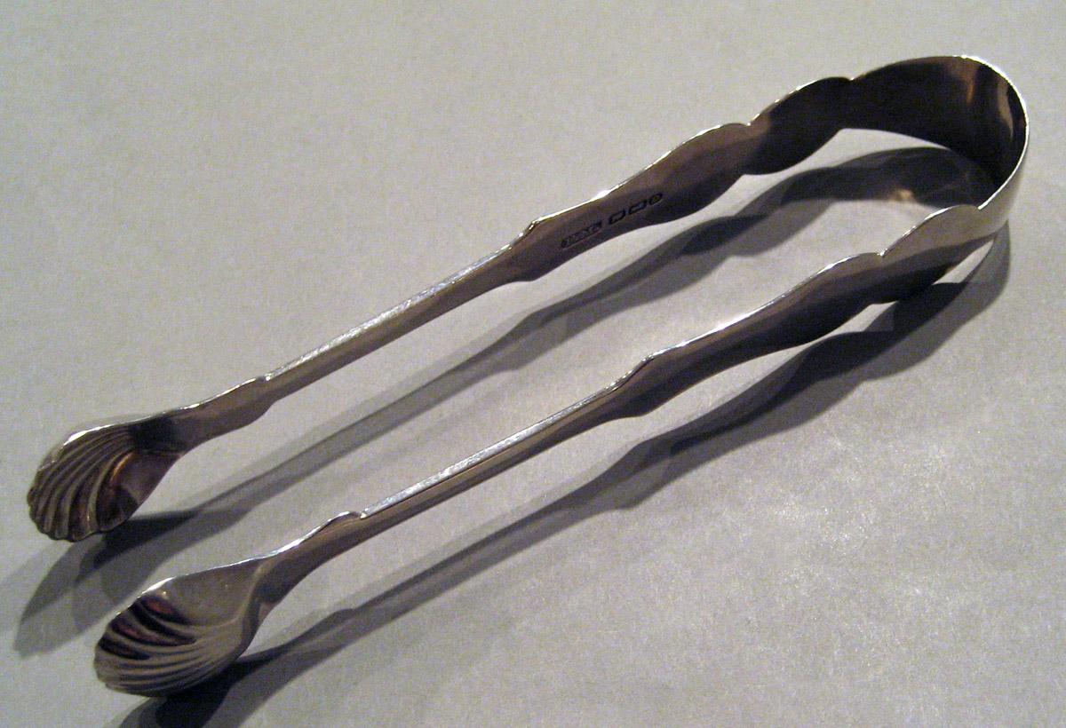 1998.0004.865 Silver Tongs view 1