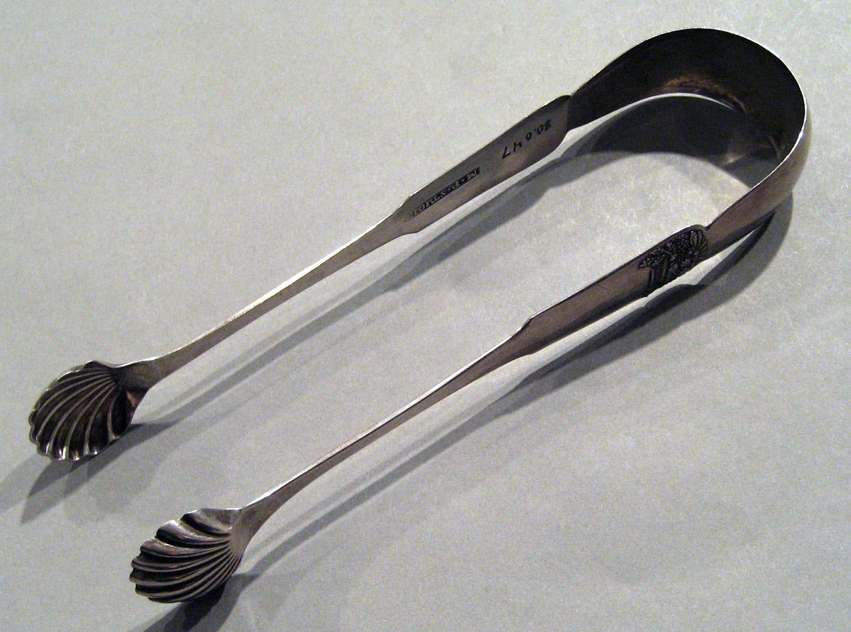 1998.0004.943 Silver Tongs view 1