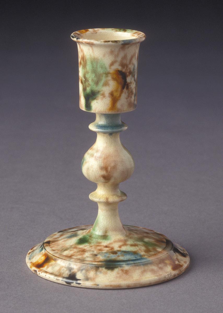 1998.0028.007 Earthenware candlestick
