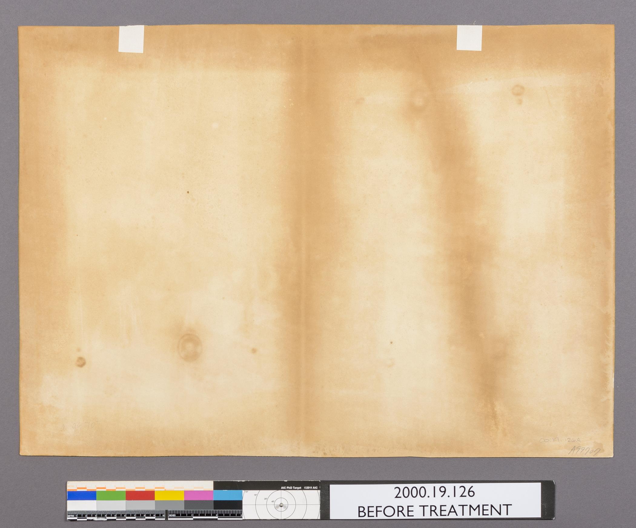 2000.0019.126 A Print, view 2, reverse, before conservation treatment