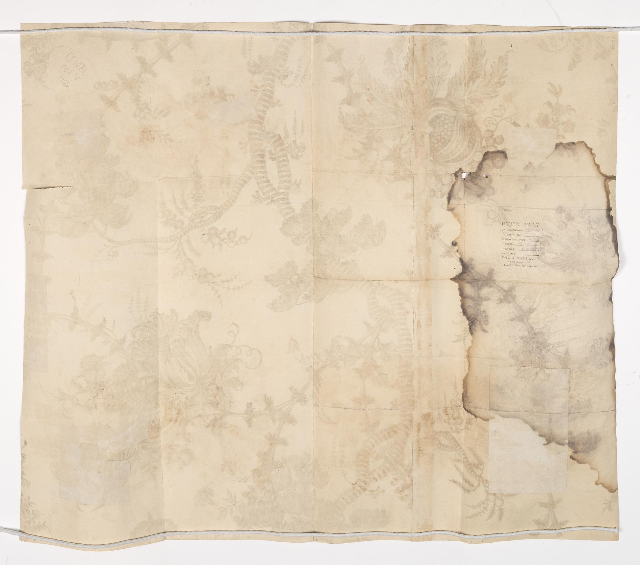 2000.0051 Paper-impression of a printed textile design, view 2, reverse