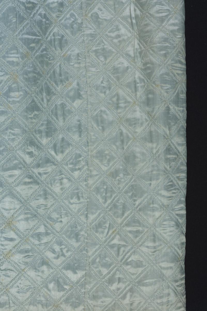 2001.0037.001 Petticoat, detail 2, before conservation treatment