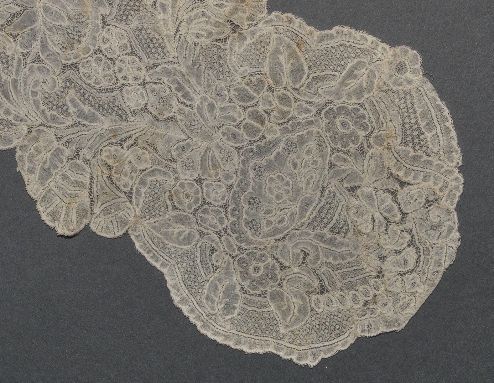 2002.0001.001.008 Lappet, detail 1, reverse