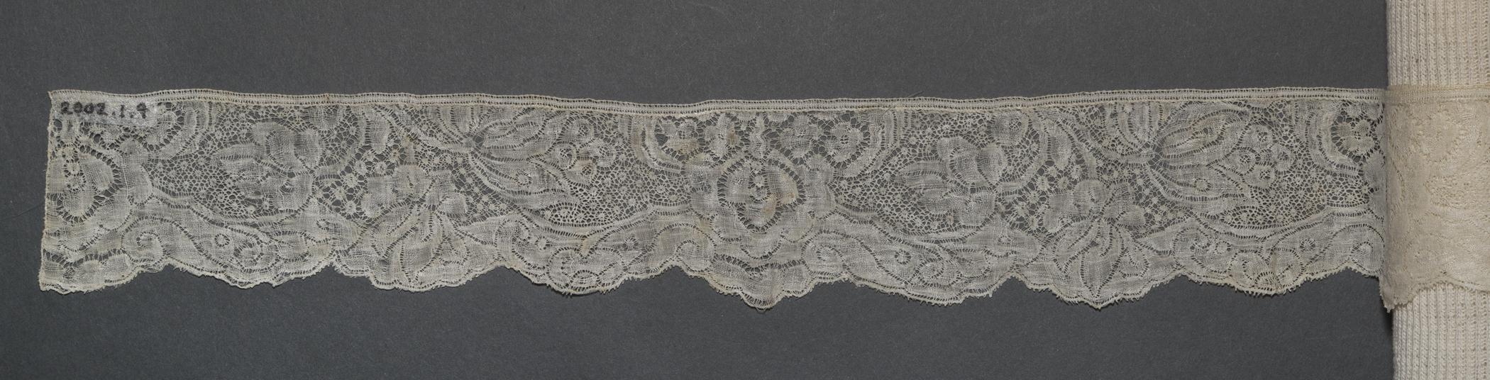2002.0001.001.009 Passementerie, overall, reverse